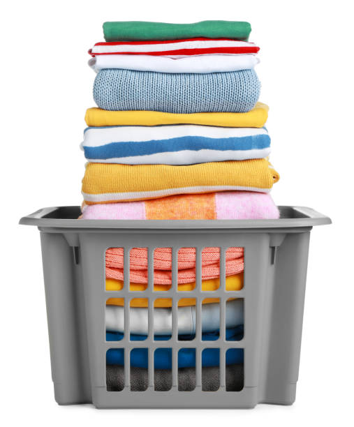 istock Plastic laundry basket with clean clothes isolated on white 1793610094