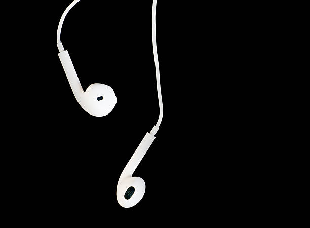 Earbuds on Black Background stock photo