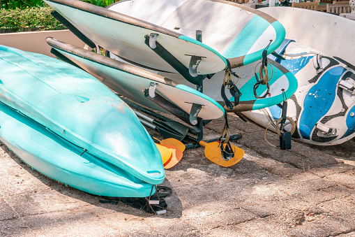 Storage of rental stand up paddle boards and kayaks at beach hotel