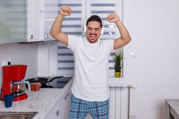 istock Kitchen soundtrack for young music lover 1793628729