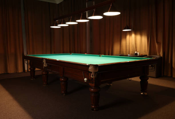istock Empty green billiard table in club. Pool Game 1793640631
