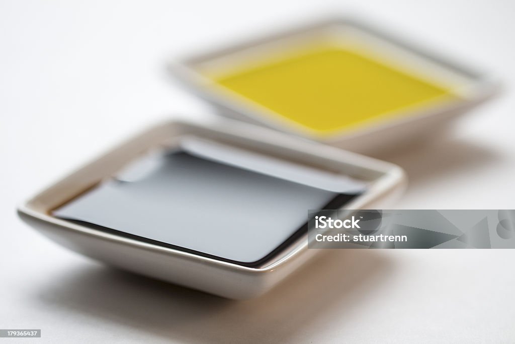 Dipping Oils Balsamic Vinegar and Olive Oil in serving dishes Appetizer Stock Photo