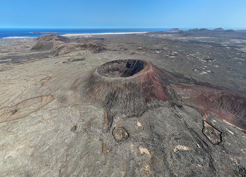 Hondo Volcano Crater - Aerial Drone Point of View. Scenic View over the Calderon Hondo Crater and  surrounding volcanic landscape. Calderon Hondo Volcano, Lajares, Fuerteventura Island, Canary Islands, Spain - Africa.