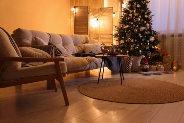 istock Beautiful room with sofa and tree decorated for Christmas. Interior design 1793662483