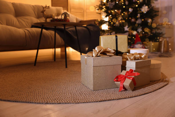 istock Beautiful gift boxes in room decorated for Christmas 1793663023