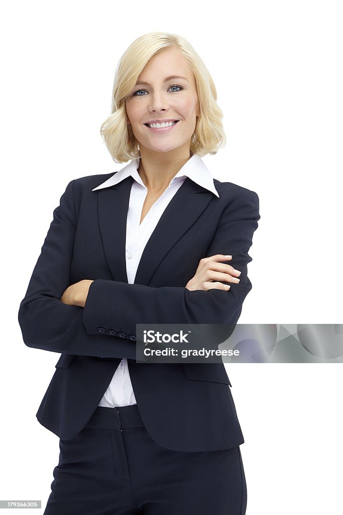 The business world is her playground A gorgeous young executive crossing her arms while isolated on a white background Financial Advisor Stock Photo