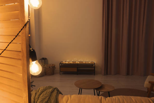 istock Tv area with cabinet, stool, coffee table and Christmas decorations in spacious room 1793666984