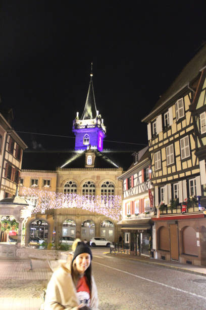 Image of a woman enjoying Christmas in the village of Obernai