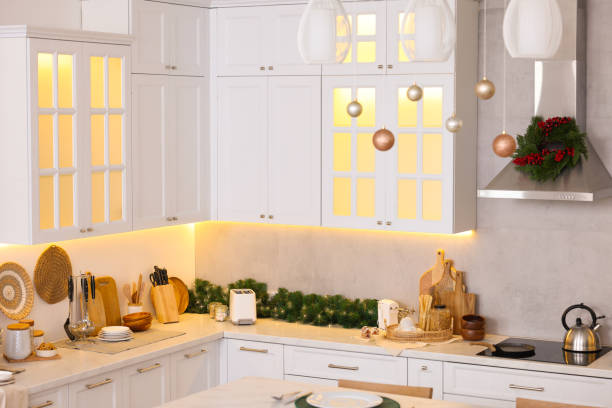 istock Stylish kitchen decorated for Christmas. Interior design 1793668104