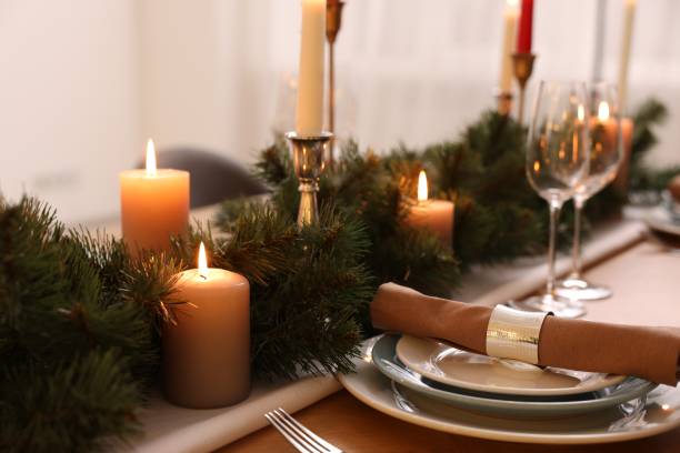 istock Luxury place setting with beautiful festive decor for Christmas dinner on wooden table 1793668663