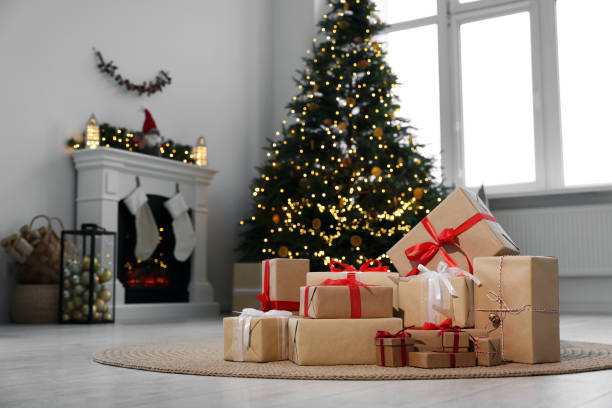 istock Many different gift boxes and Christmas decor in living room 1793670973
