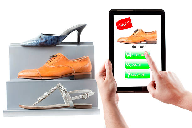 istock Comparing Prices of Womens Shoes on Tablet Computer 179370568