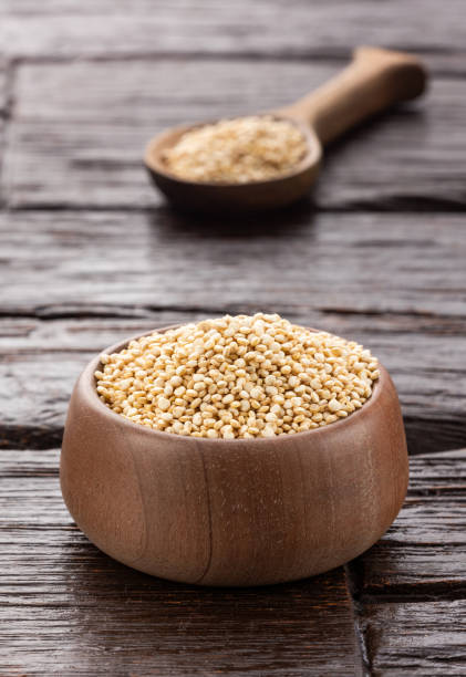 istock Raw white organic quinoa seeds - Healthy cereal 1793712870