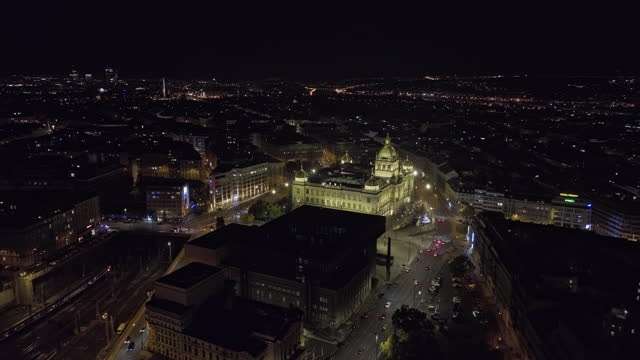 Prague Czechia Aerial v99 drone flyover main railway station towards national museum capturing light up architecture exterior and night cityscape of new town - Shot with Mavic 3 Cine - November 2022