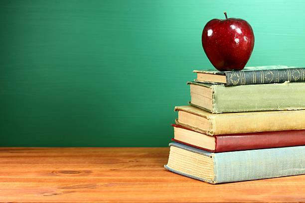 istock Back to School Books and Apple With Blank Chalkboard 179372552
