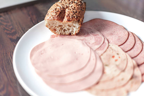 Mixed meat delicatessen plate ready for a sandwich.