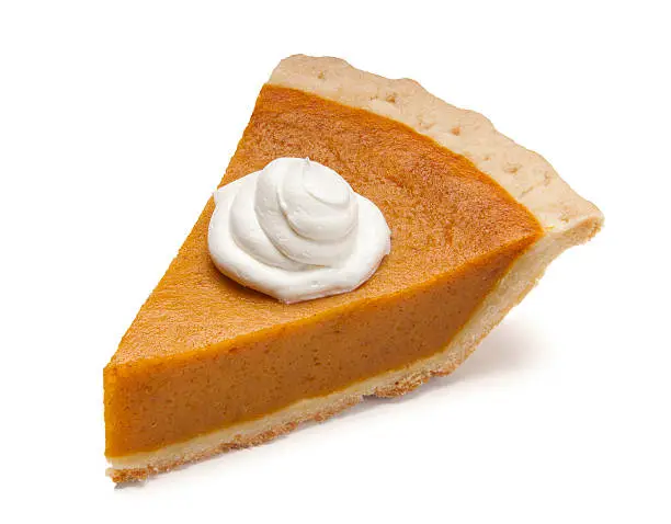 Pumpkin pie slice with whipped cream.  Please see my portfolio for other food and holiday related images.