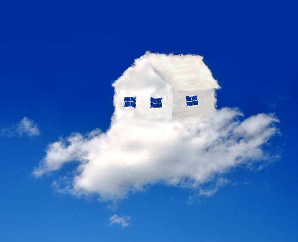 istock White fluffy cloud house floating in bright blue sky 179375903