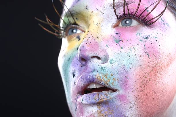 istock Stunning Woman With Extreme Spattered Make Up on the Face 179376112
