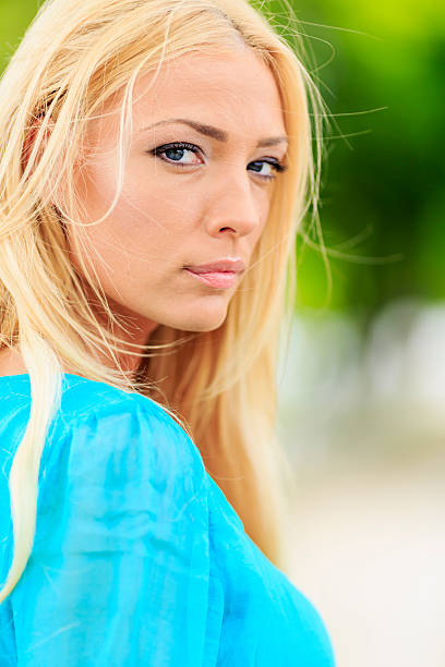 Young blond woman in the field