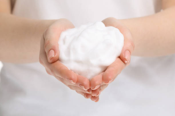 istock Woman with bath foam on white background, closeup 1793781283
