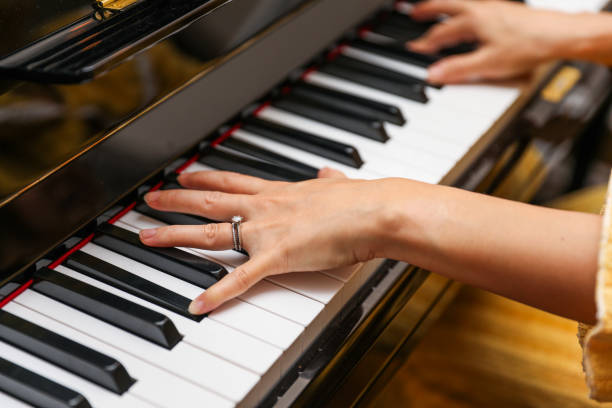 istock piano keys, a symphony of passion. Emotion flows through the fingertips, capturing the essence of music in a captivating and timeless image 1793783922
