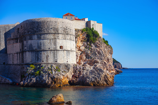 Fort Bokar at rugged coastline of Dubrovnik in Croatia .  Defensive walls that surround the city of Dubrovnic
