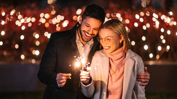 istock Couple holding sparklers 1793805326