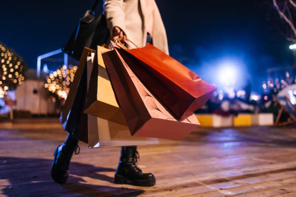 istock Woman with shopping bags 1793805845