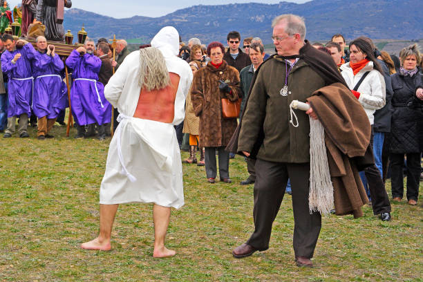 San Vicente de la Sonsierra, Spain - Good Fridey March 21, 2008: Man does penance through self-flagellation during Easter holy procession on March 21, 2008, San Vicente de la Sonsierra, Spain.