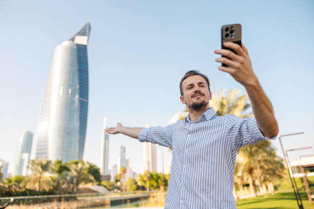 istock Handsome young man using his phone in downtown city 1793851697