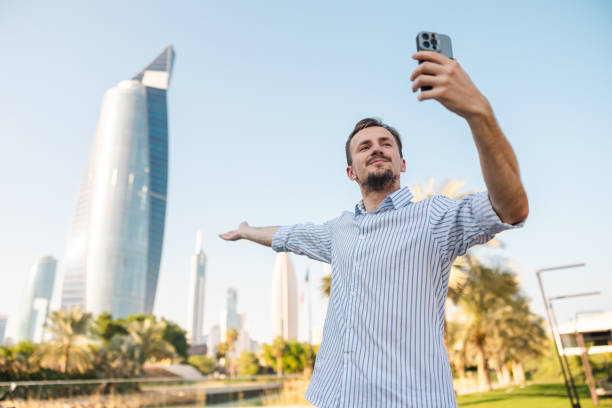istock Handsome young man using his phone in downtown city 1793851700