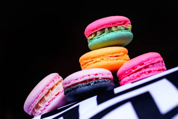 colored macaroons with cream