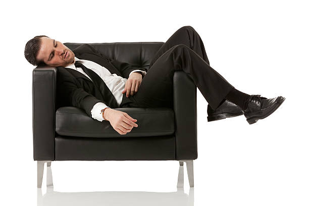 istock Businessman sleeping on armchair 179387628