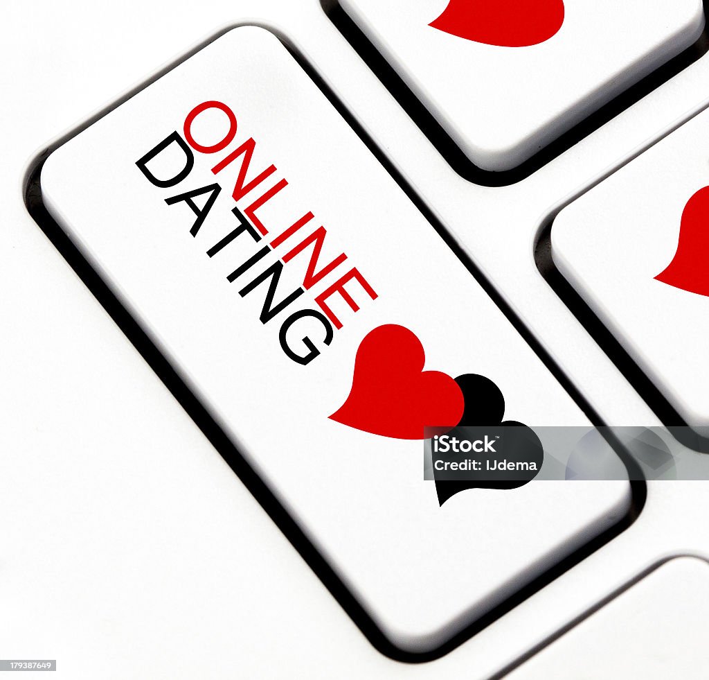 Online dating button with heart shaped talk cloud Online dating button with heart shaped talk cloud on keyboard Backgrounds Stock Photo