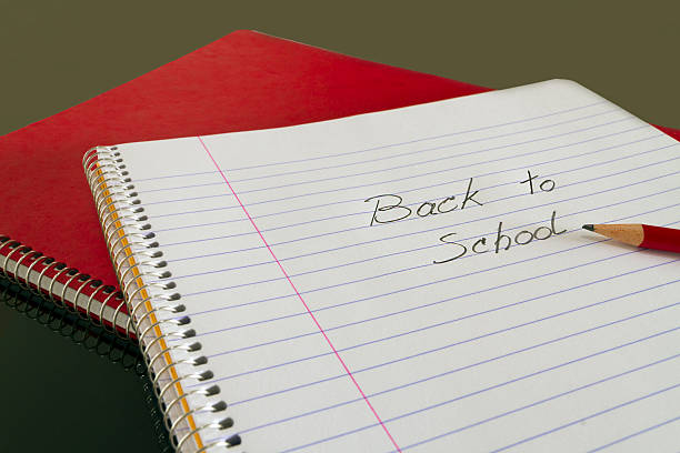 istock back to school in notebook with pencil 179388934