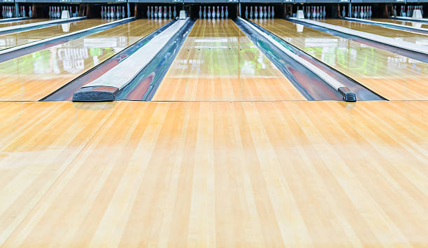 Bowling alley.With surface polished with wax beautifully. Bowling alley.With surface polished with wax beautifully. bowling alley stock pictures, royalty-free photos & images