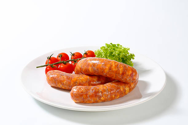 istock sausages and vegetable garnish 179389376
