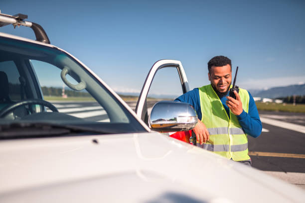 istock Hispanic Airfield Operations Officer Coordinating Dispatches 1793895441