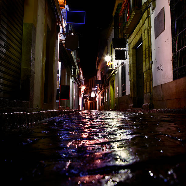 istock Dark Cobblestone Street 179390389