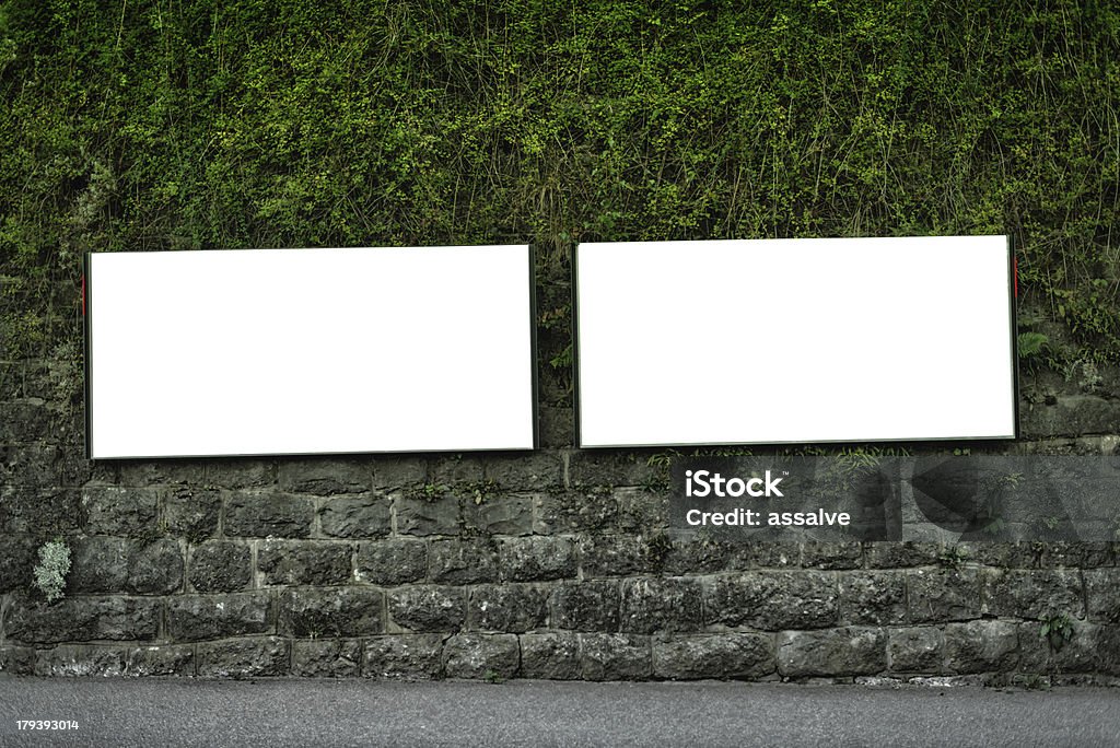 Zwei Plakate an der Wand in der Schweiz - Lizenzfrei Plakatwand Stock-Foto