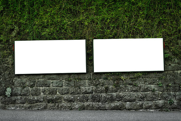 two billboards on wall in Switzerland
