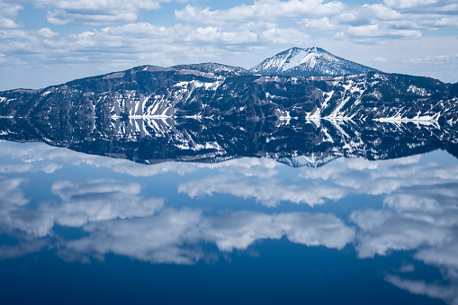 Reflections of the clouds in Crater Lake.