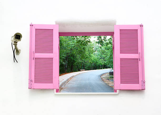 istock Greek style windows with cctv and curve road 179396047