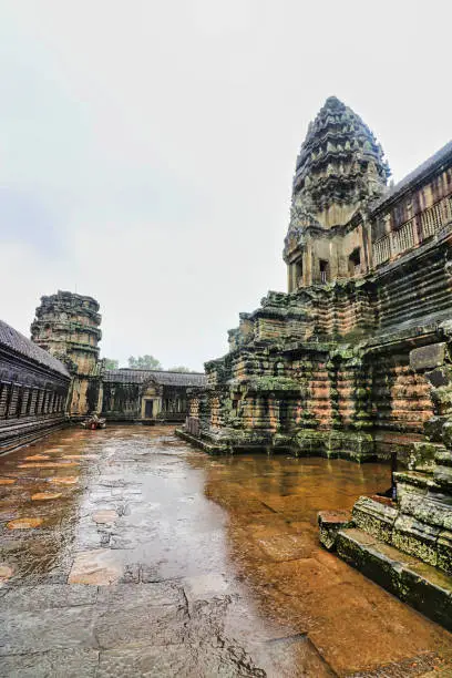 A view of the monsoon drenched inner courtyard of the Angkor Wat Temple complex at Siem Reap, Cambodia, Asia