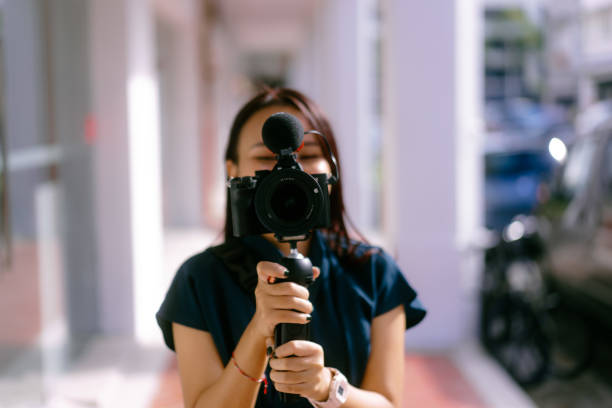 istock Asian Girl Vlogging with Mirrorless Camera and Mic 1793977698