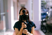 Asian Girl Vlogging with Mirrorless Camera and Mic