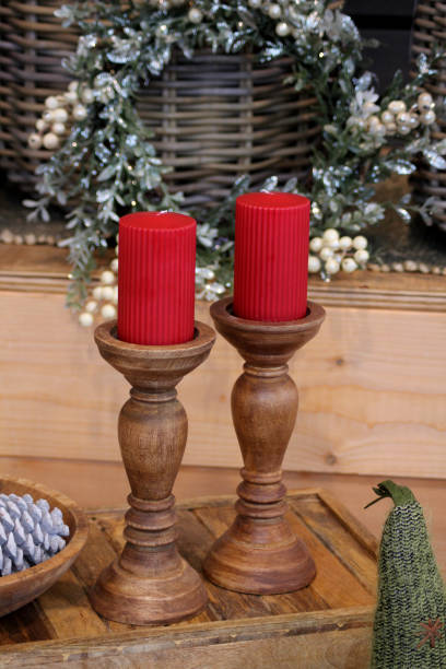 istock Christmas decorations with two red candles 1793987684