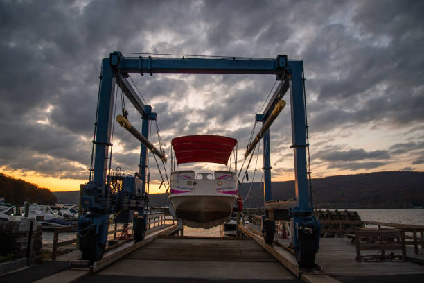 A view of a hanging boat in the sunset