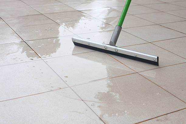 istock cleaning rain water in the floor, outdoor. 179400849